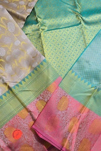 Close-up of colorful fabric with patterns and textures.