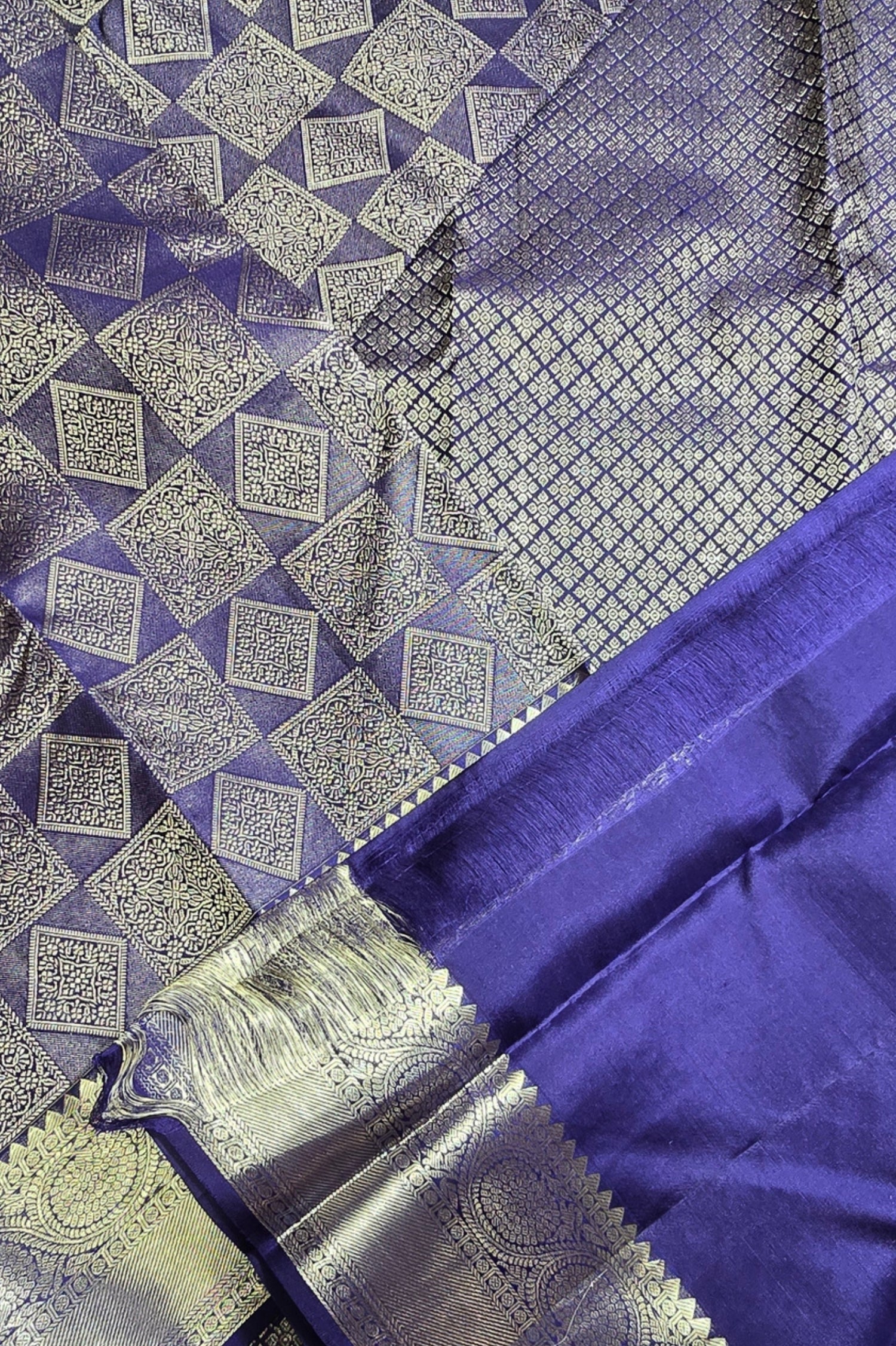 Blue fabric with silver geometric patterns