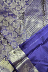 Blue fabric with silver geometric patterns