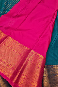 Graceful Light Blue Semi Kanchi Silk Saree with Pink Border