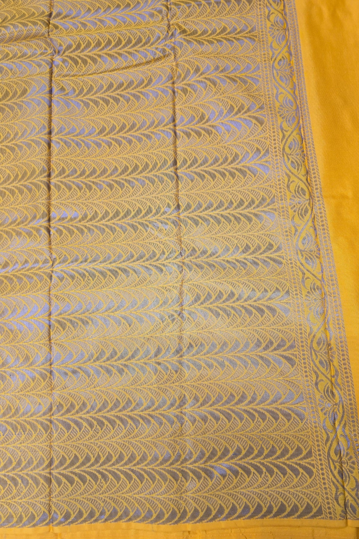 Radiant Yellow Semi Silk Saree with Elegant Floral Design