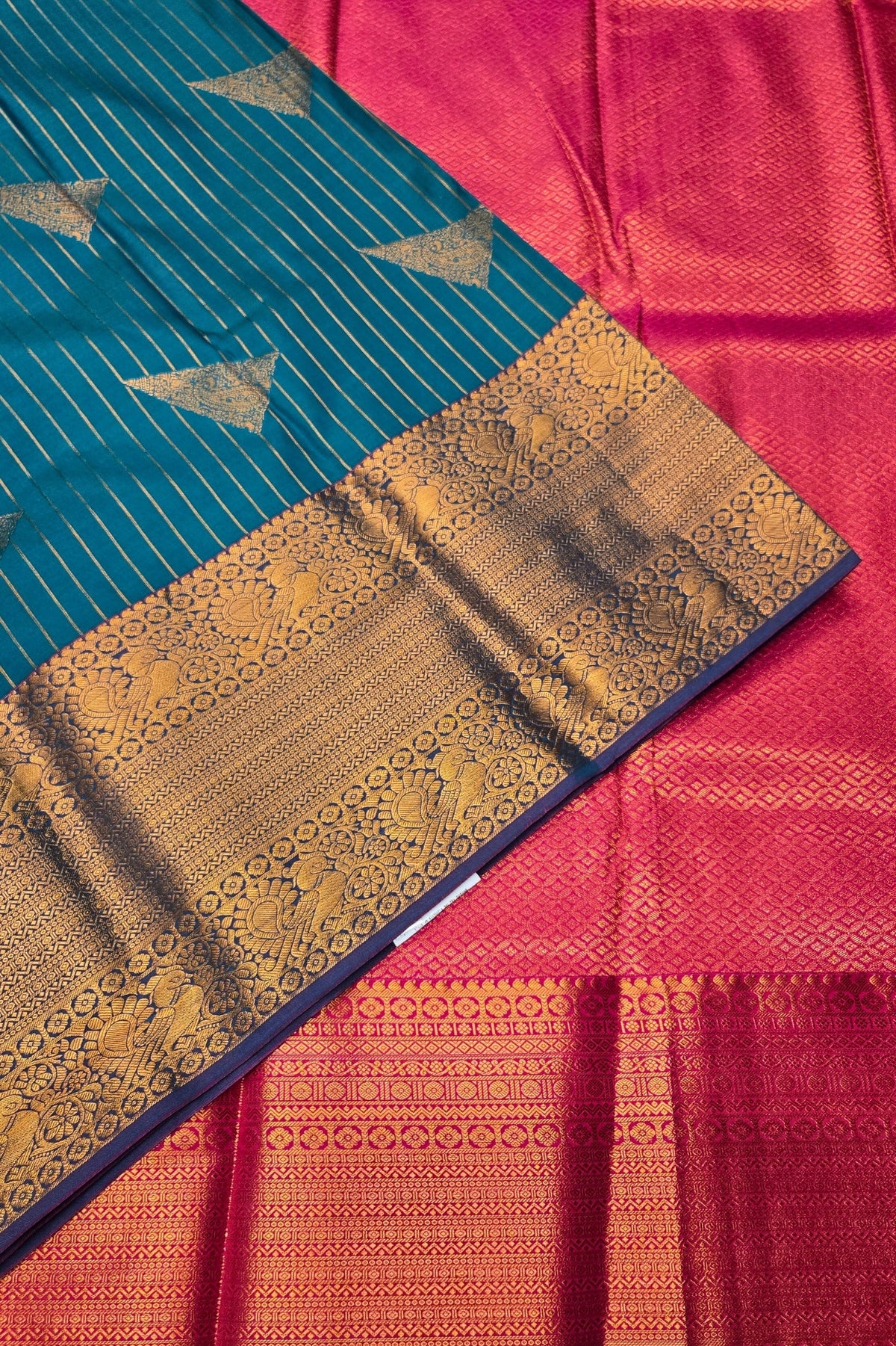 Graceful Light Blue Semi Kanchi Silk Saree with Pink Border