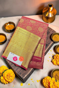 Traditional saree with a floral arrangement and decorative items on a light background