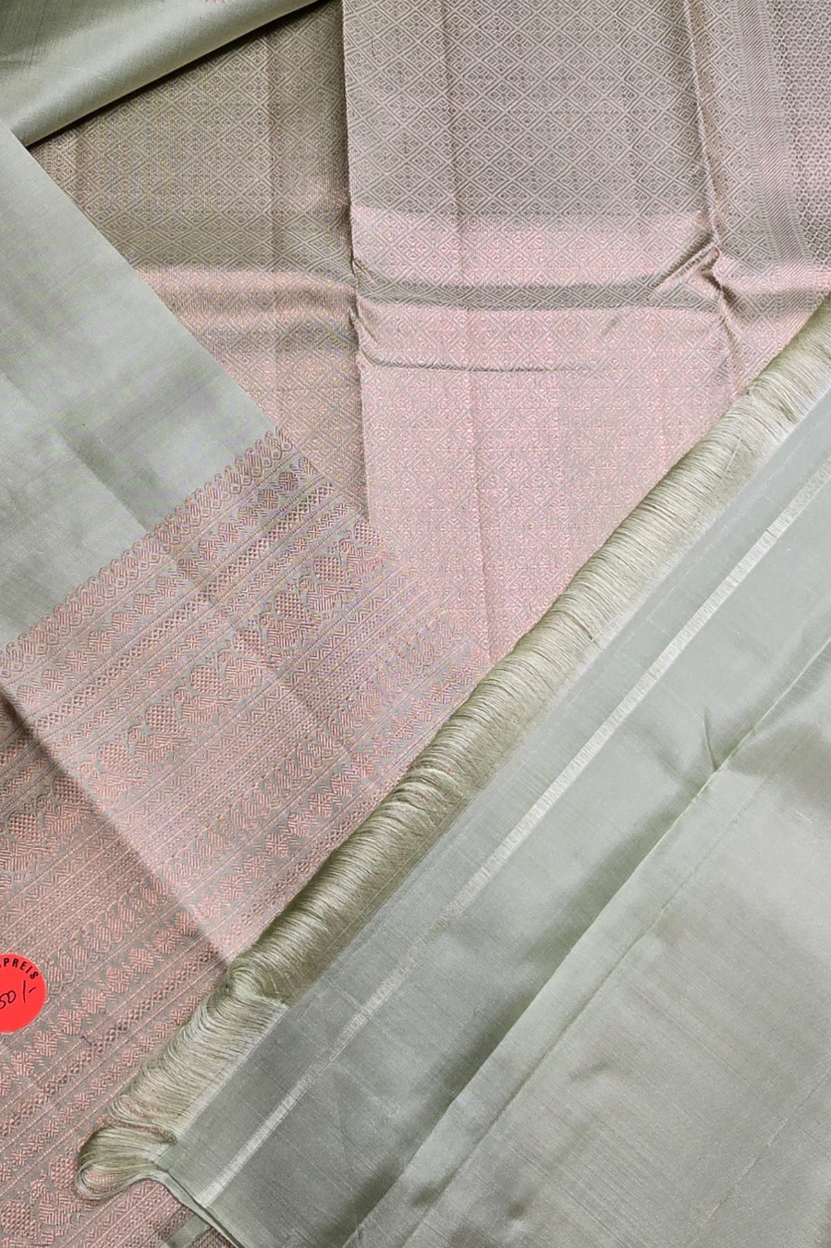 Close-up of fabric with pink and gray patterns