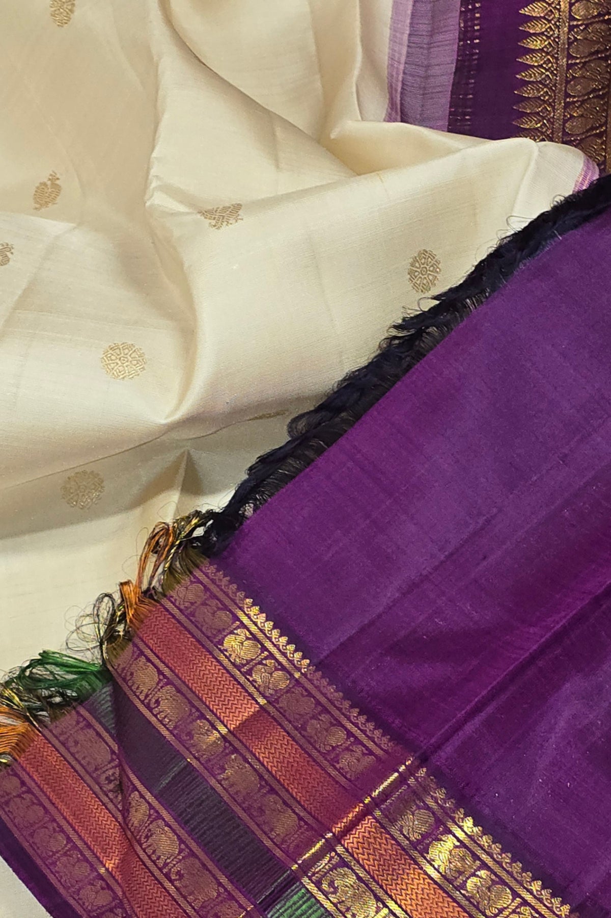 Creamy White Saree with Purple Pallu and Colorful Border