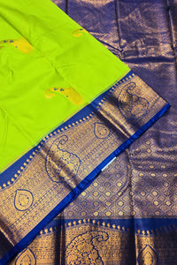Green and blue saree with gold patterns