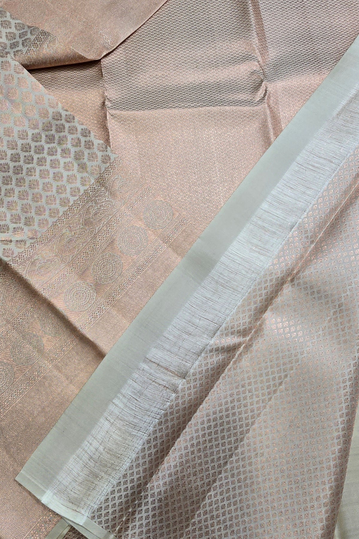 Close-up of beige fabric with a textured pattern