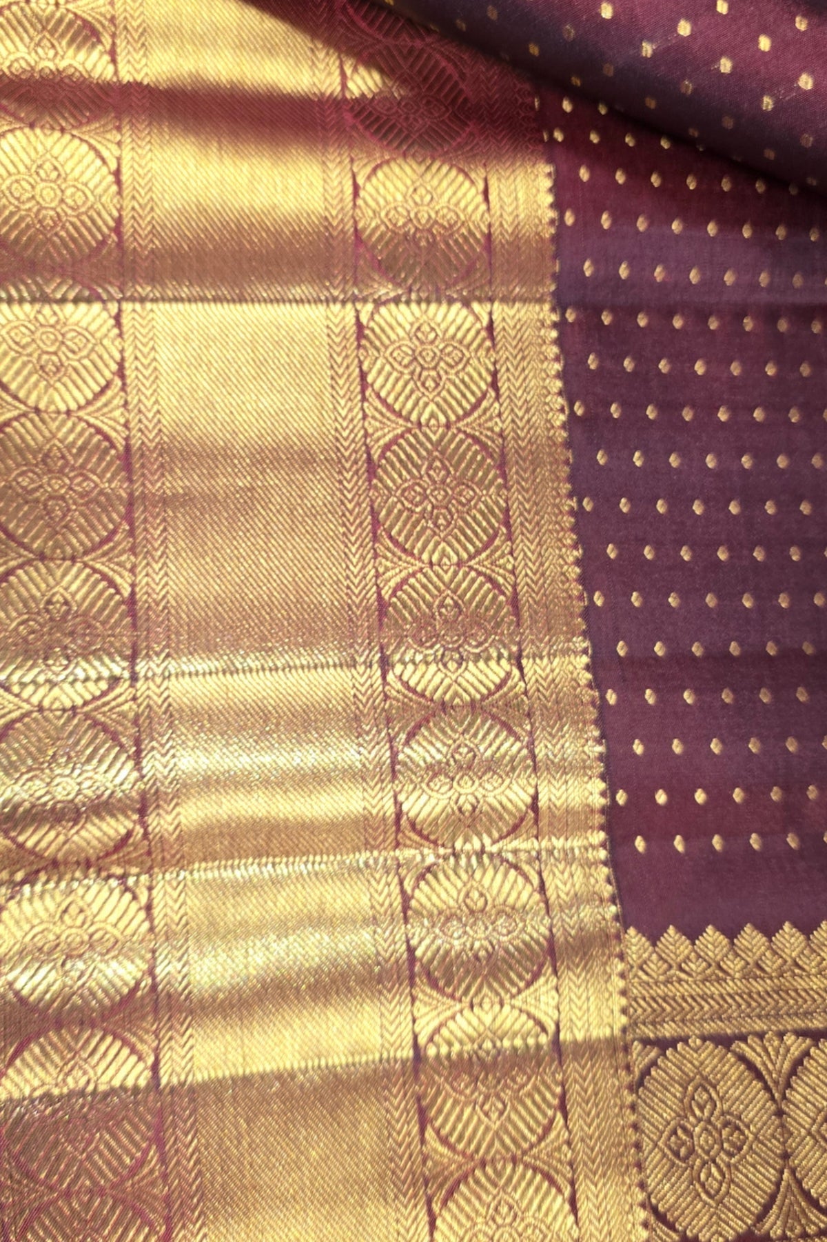 Purple fabric with gold patterns