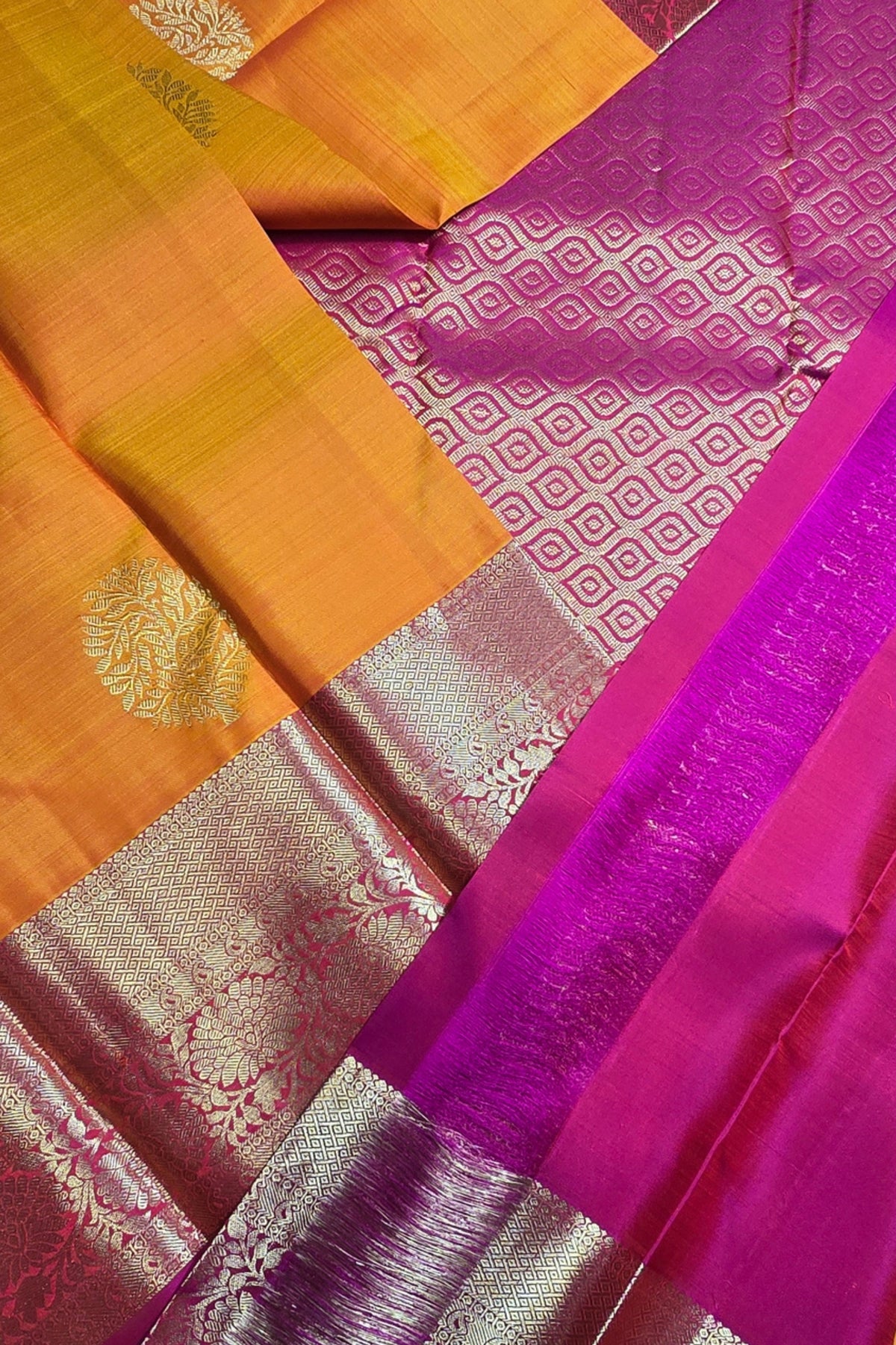 Colorful saree with orange, pink, and purple patterns