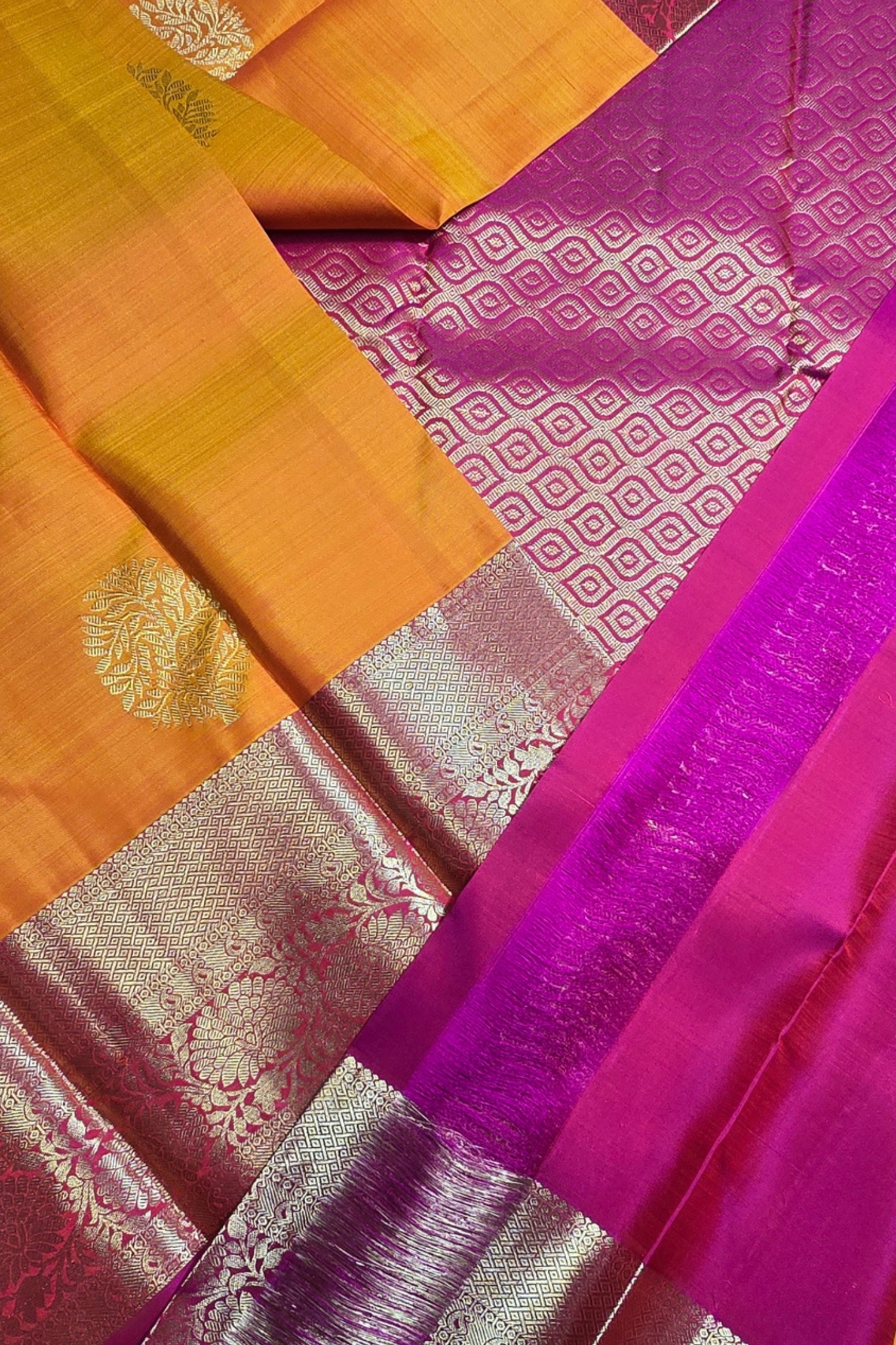 Colorful saree with orange, pink, and purple patterns