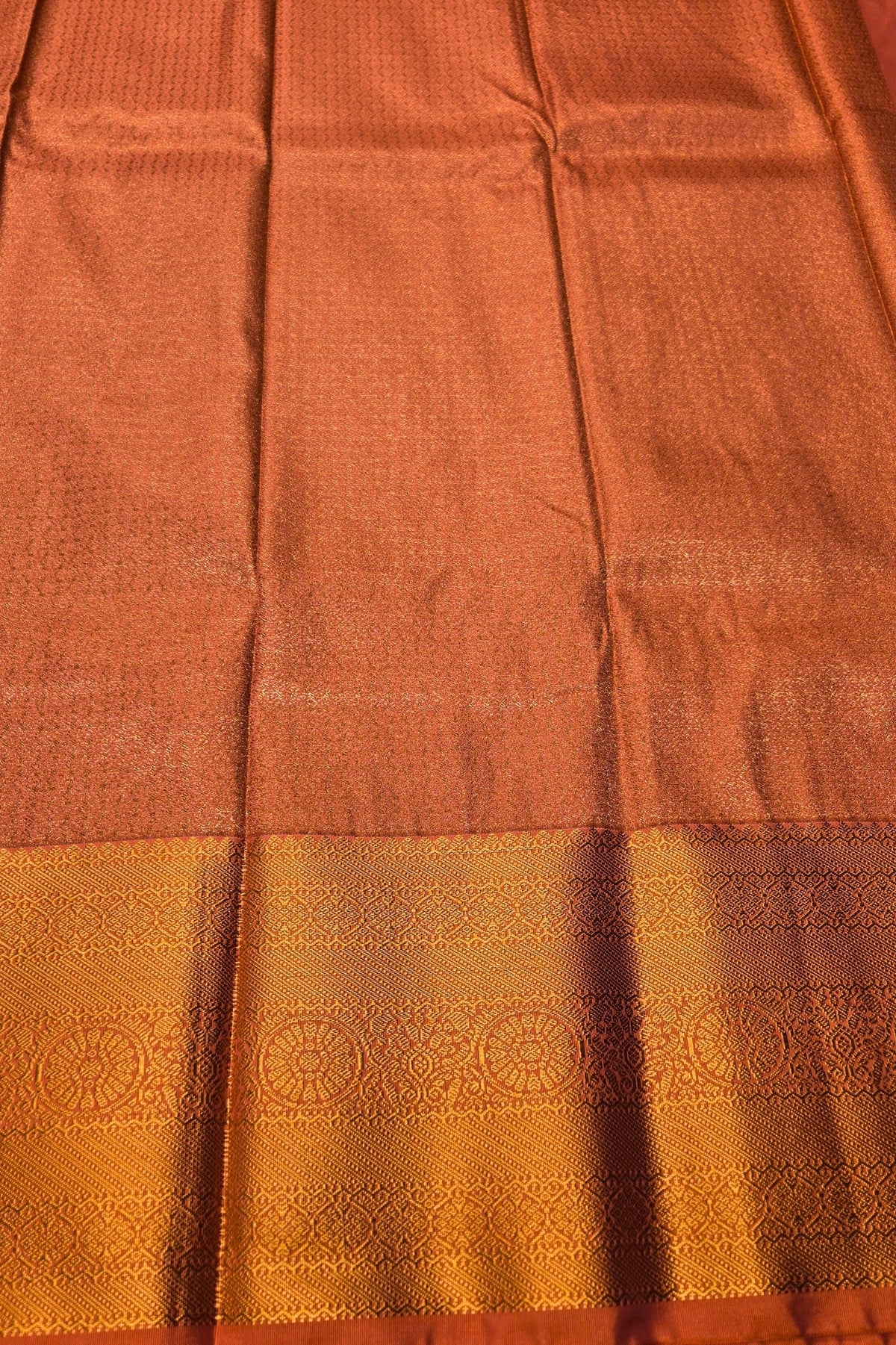 Brown fabric with a gold border