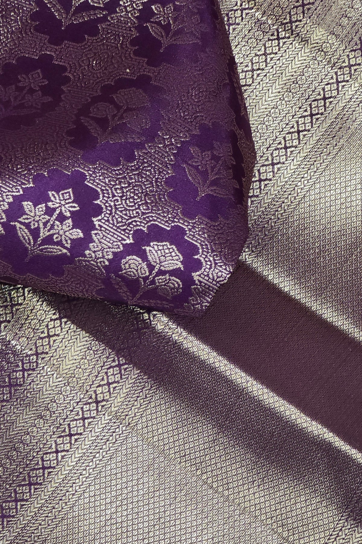 Royal Purple Kanchipuram Silk Saree with Silver Floral Patterns