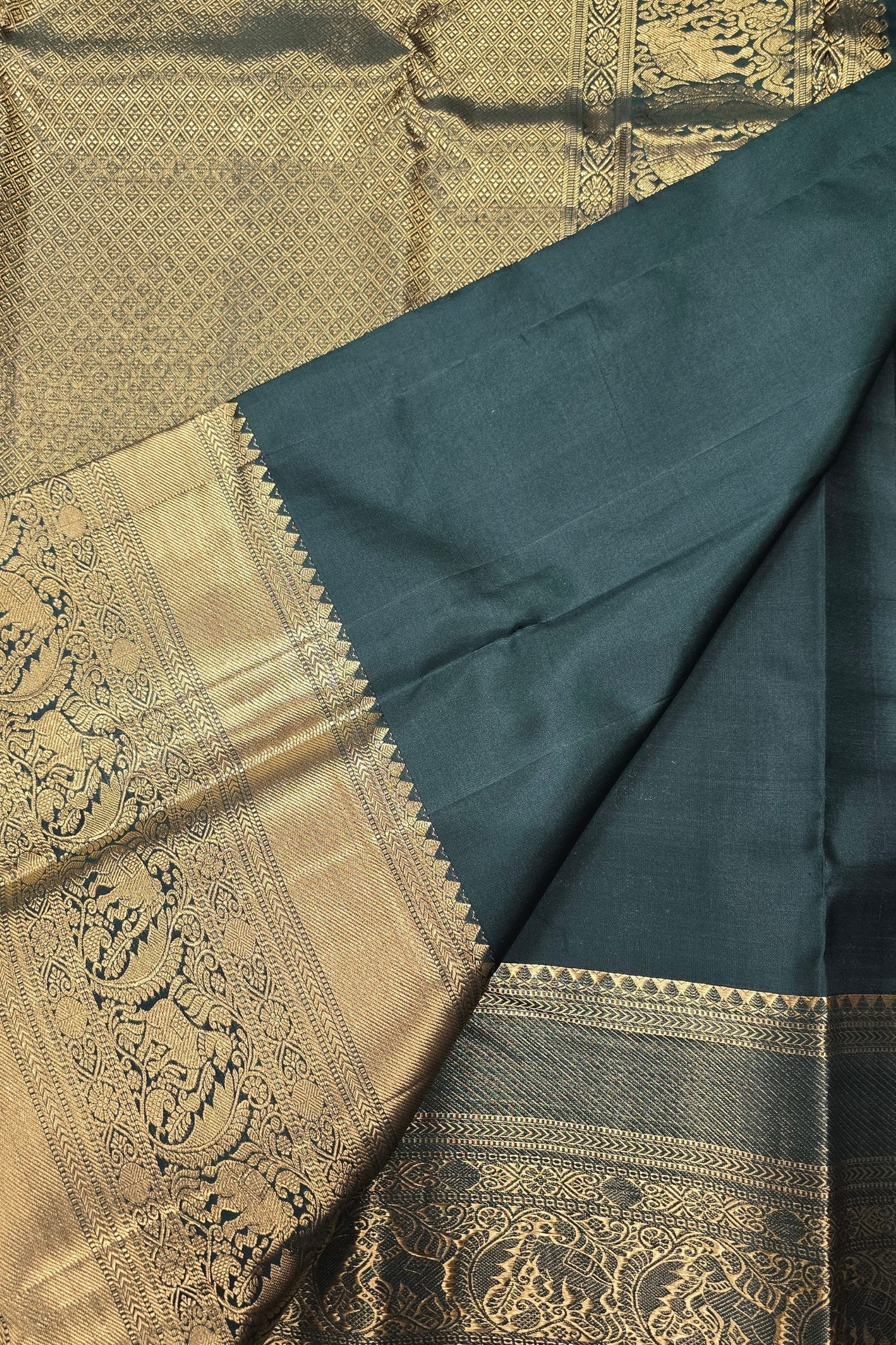Dark Green Kanchipuram Silk Saree with Gold Border – Bold & Majestic