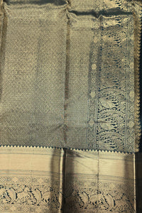 Dark Green Kanchipuram Silk Saree with Gold Border – Bold & Majestic