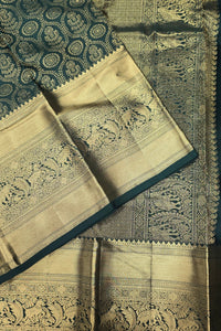 Dark Green Kanchipuram Silk Saree with Gold Border – Bold & Majestic
