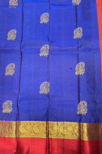 Navy Blue Kanchipuram Silk Saree with Red & Gold Border – Grand & Traditional
