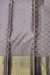 Purple fabric with gold and black pattern