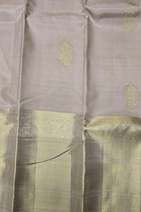 Beige Kanchipuram Silk Saree with Maroon Pallu – Classic & Timeless