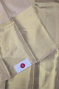 Beige Kanchipuram Silk Saree with Maroon Pallu – Classic & Timeless