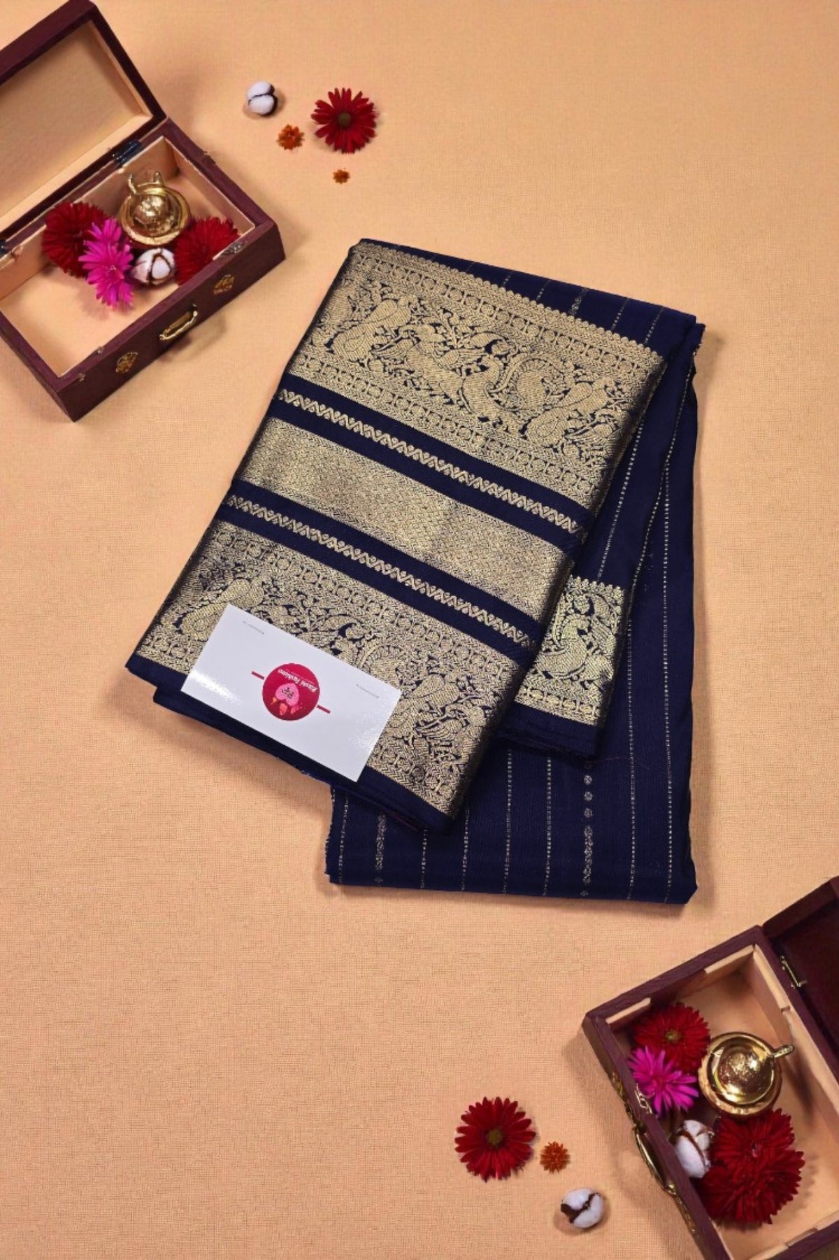 Decorative saree with intricate patterns on a beige background