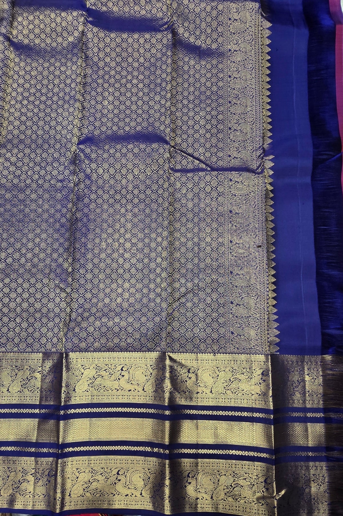 Traditional saree with blue and gold patterns
