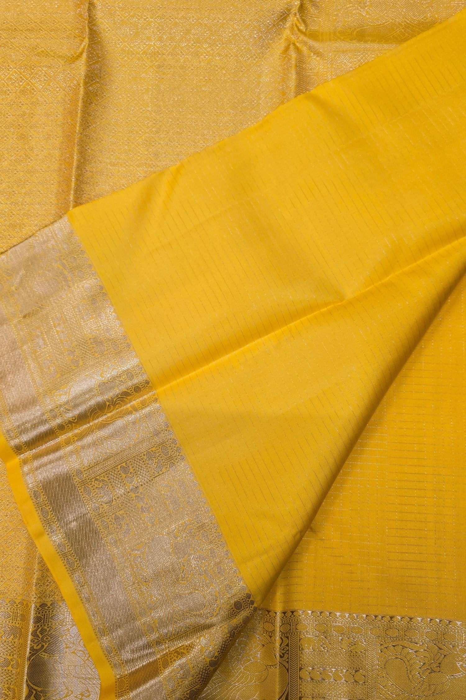 Yellow Kanchipuram Silk Saree with Gold Border – Bright & Elegant