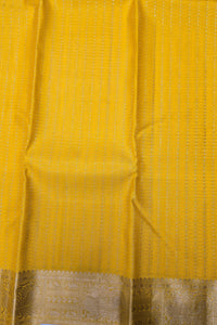 Yellow fabric with a subtle pattern and brown border