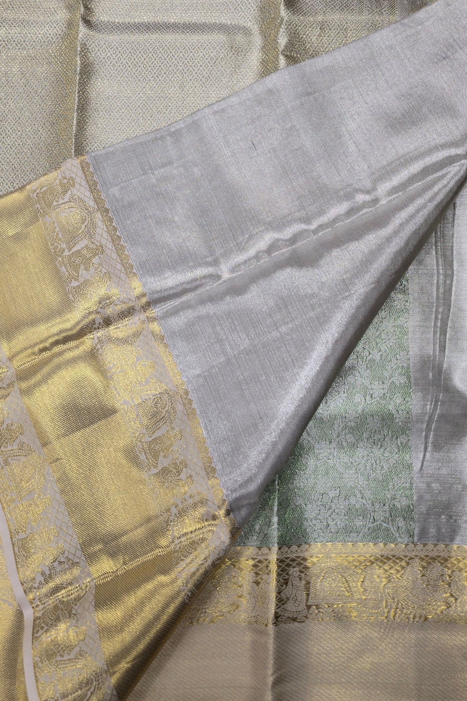 Close-up of a fabric with gold and gray patterns