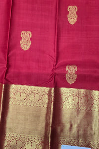 Red fabric with gold embroidery and patterns
