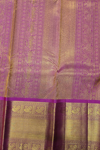Purple and gold traditional fabric with intricate patterns