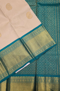 Pale Silver Kanchipuram Silk Saree with Blue Border – Soft & Refined