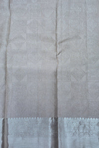 Close-up of a gray fabric with a subtle pattern