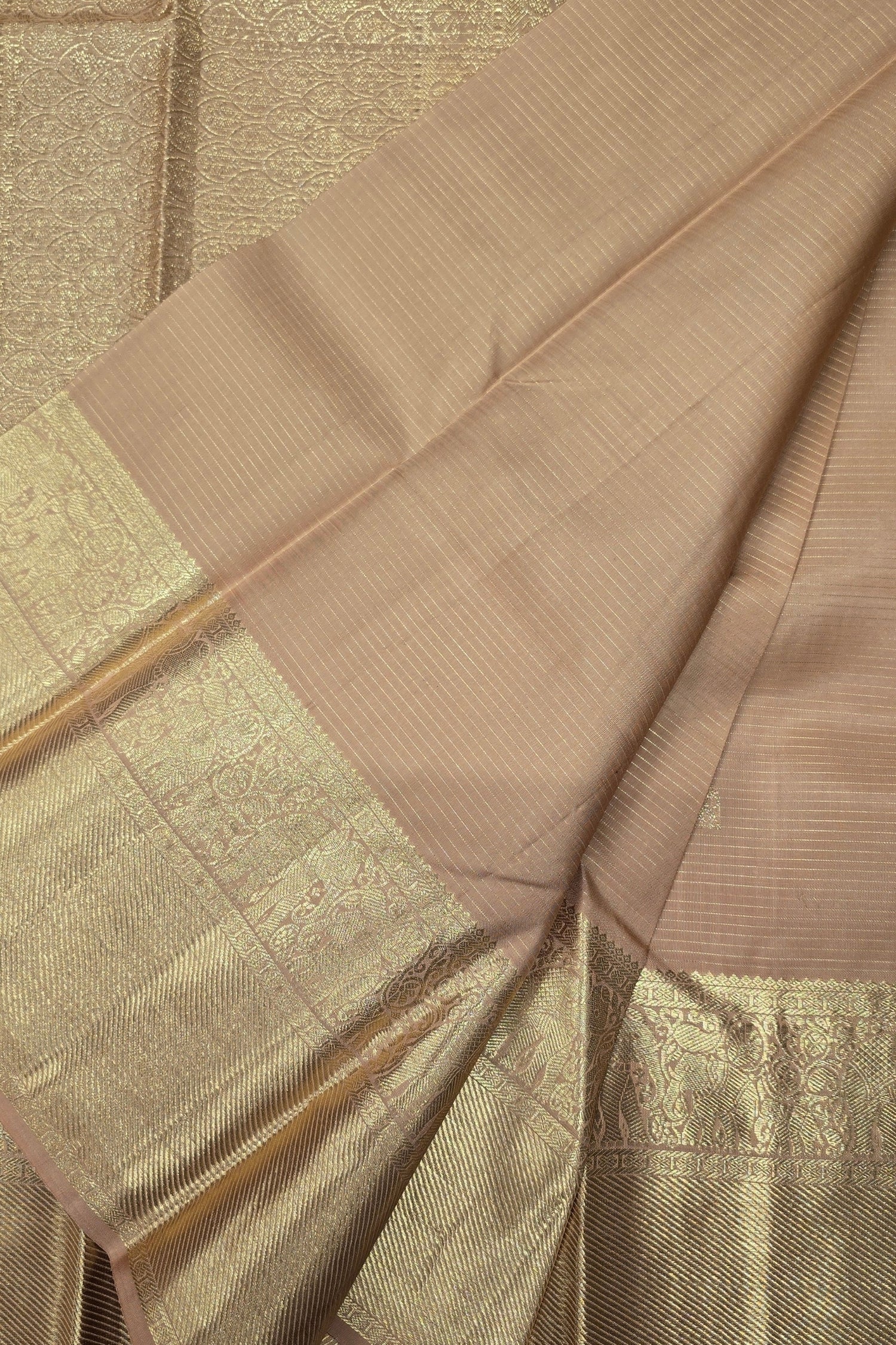 Close-up of a brown fabric with a textured pattern on a matching background