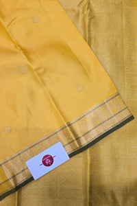 Yellow Kanchipuram Silk Saree with Grey Pallu – Bright & Graceful