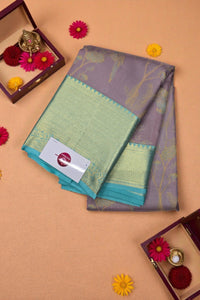 Folded fabric with a brand label on a beige background with decorative flowers.