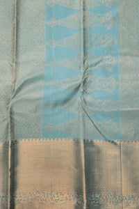Close-up of a fabric with a blue and beige pattern