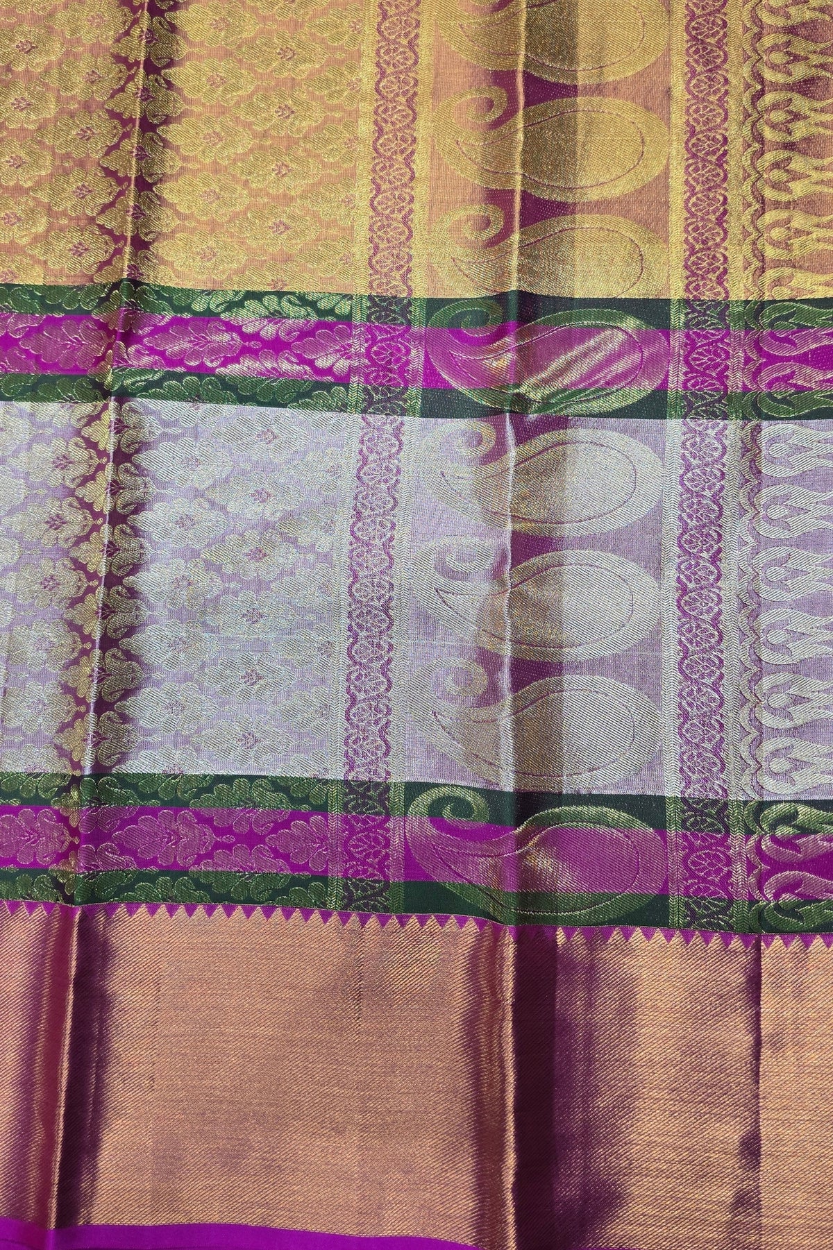 Patterned fabric with green, purple, and brown colors