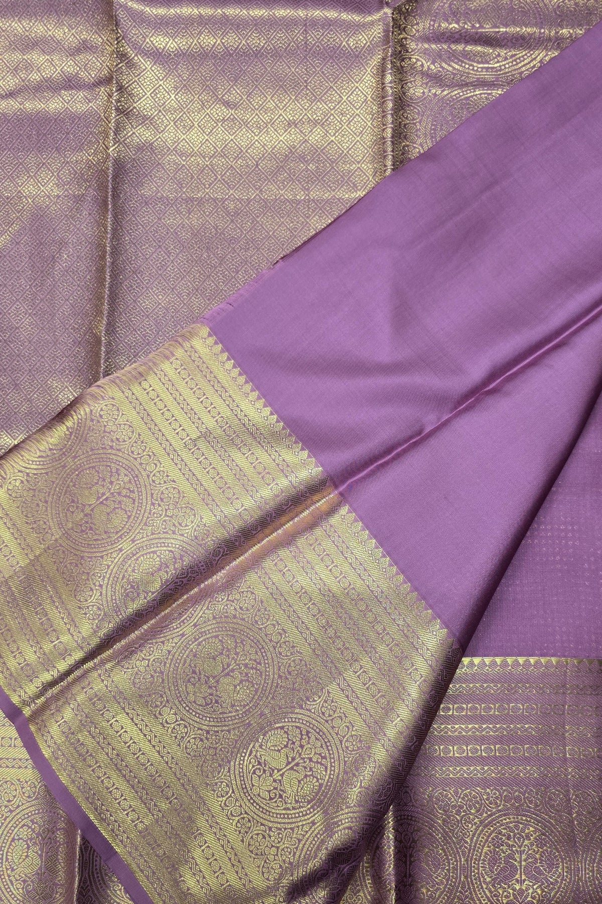 Purple fabric with gold border and pattern