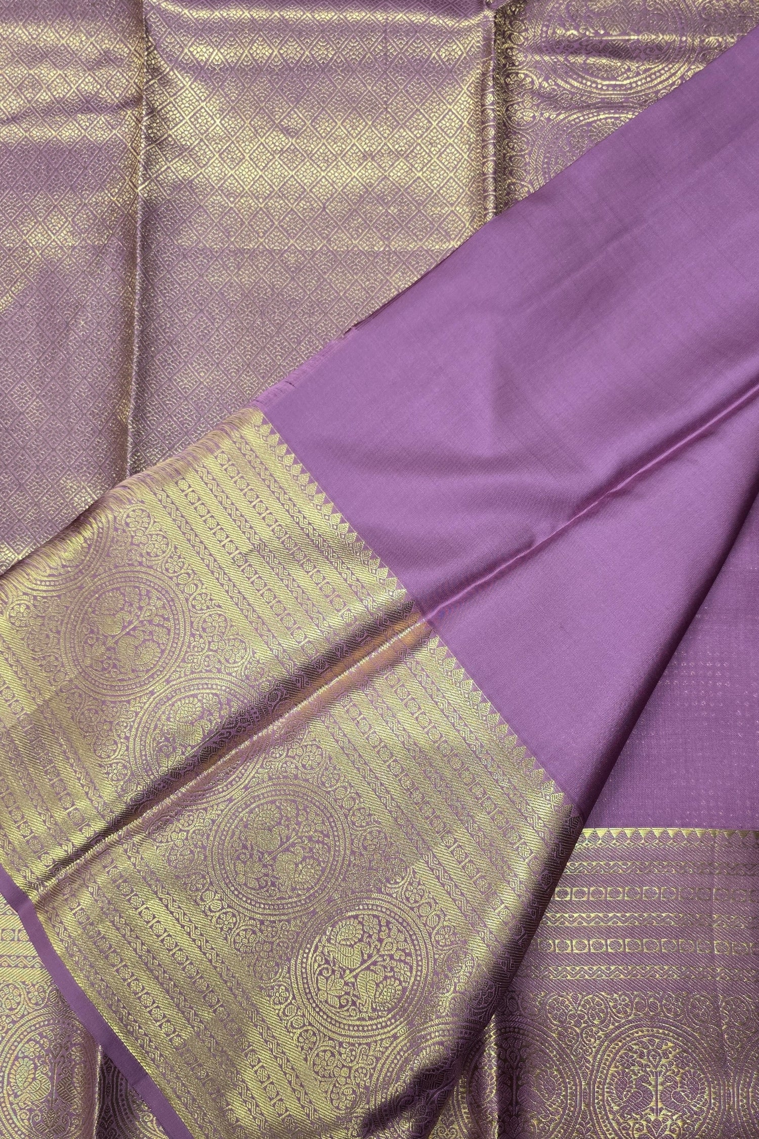 Purple fabric with gold border and pattern