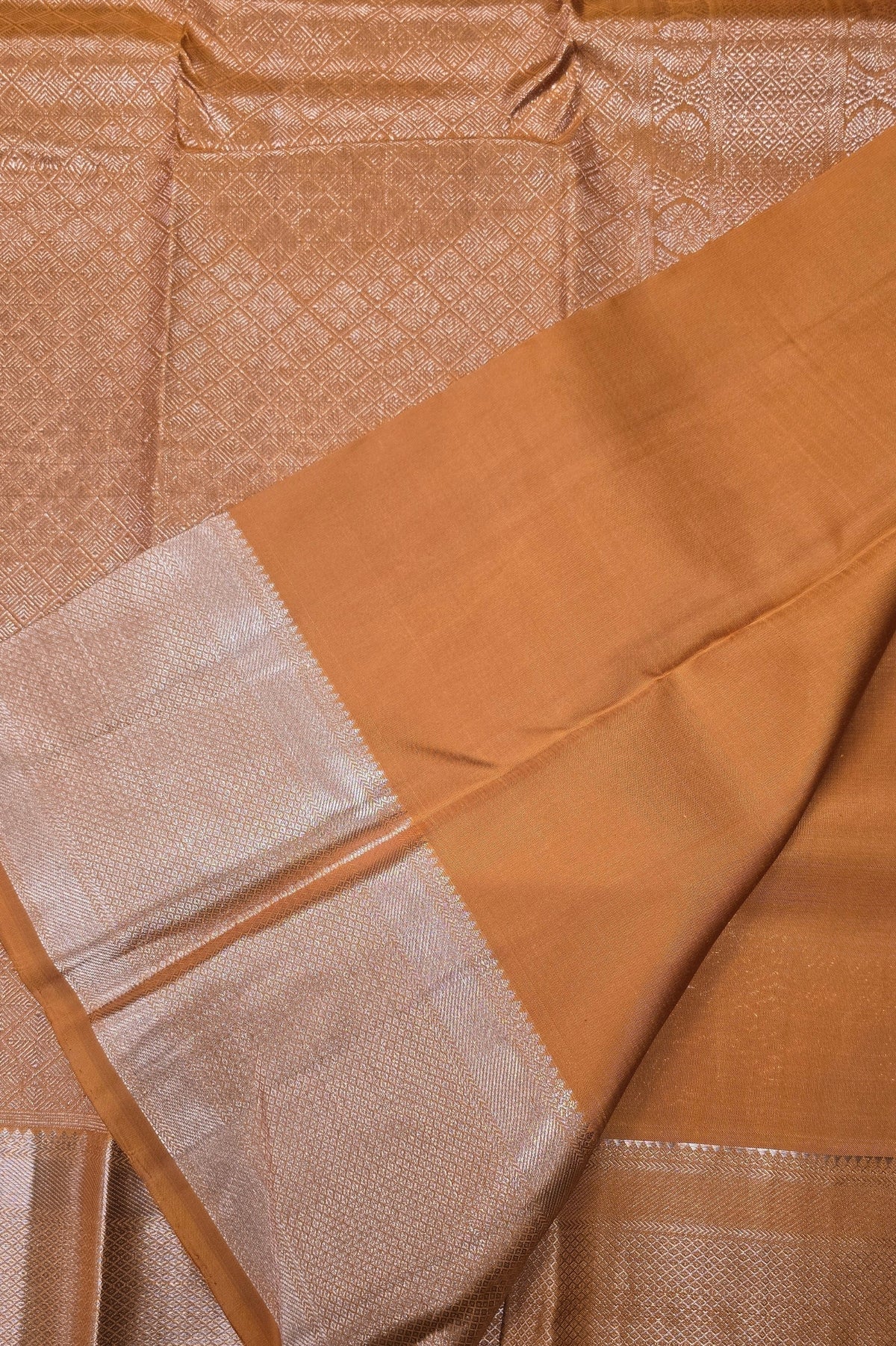 Close-up of brown fabric with a textured pattern