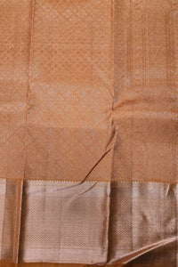 Close-up of a brown fabric with intricate patterns