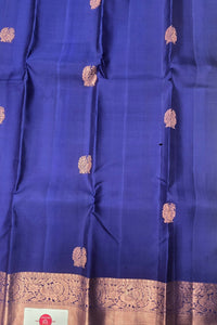 Blue fabric with gold embroidery and border