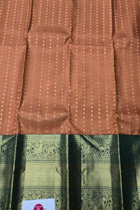 Brown fabric with a subtle pattern on a green and black background