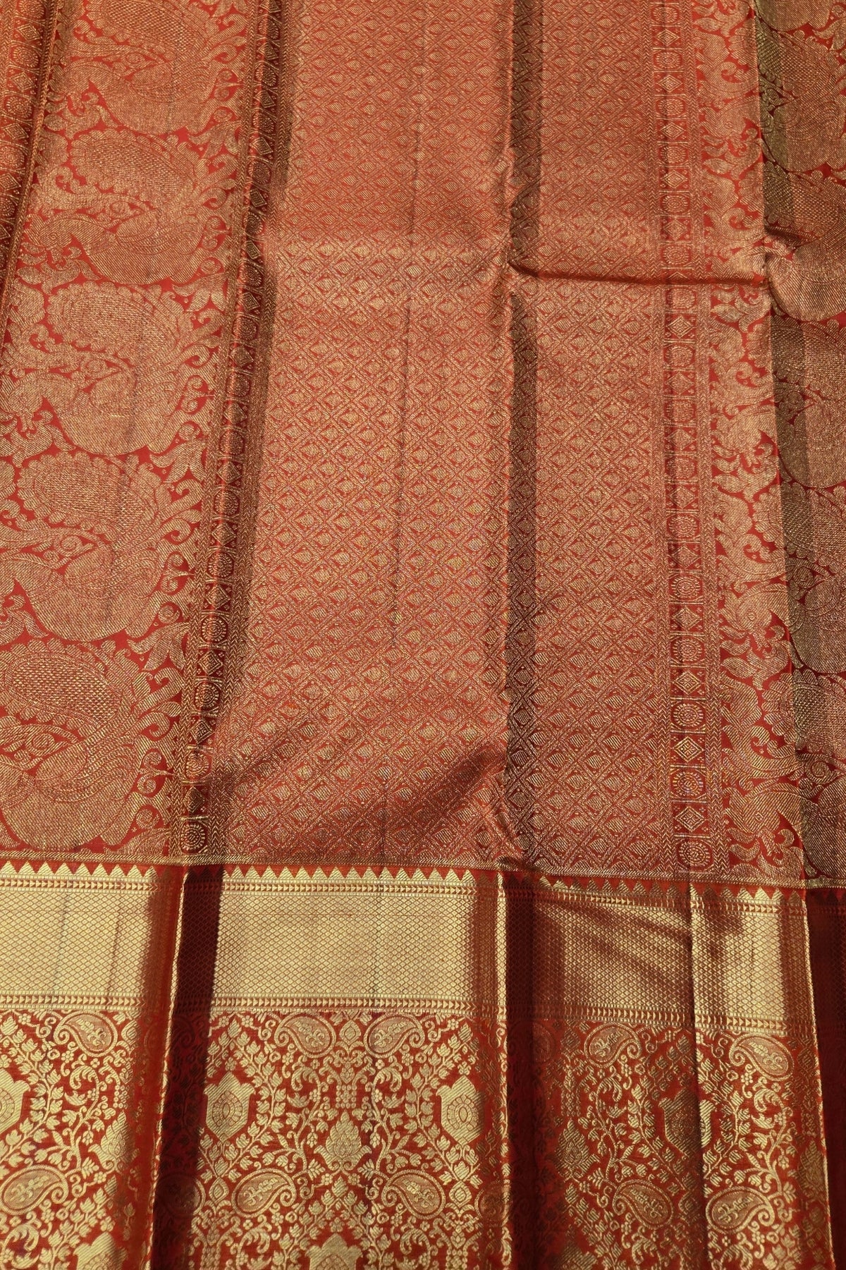 Close-up of a patterned fabric with intricate designs.