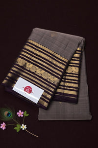 Textile with gold patterns on a dark background