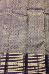 Textured fabric with a diamond pattern and blue and gold border