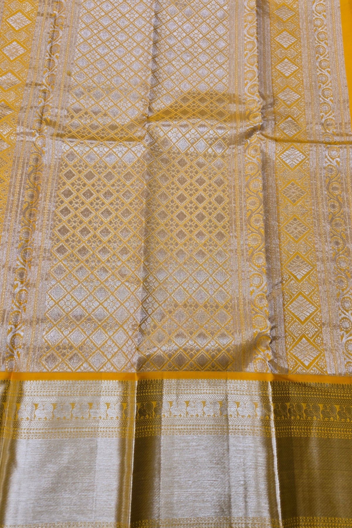 Yellow Kanchipuram Silk Saree with Diamond Pattern and Border