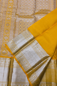 Yellow Kanchipuram Silk Saree with Diamond Pattern and Border