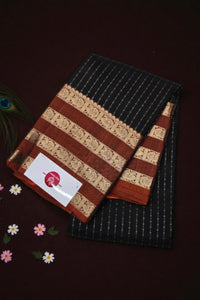 Striped fabric with a brand label on a dark background