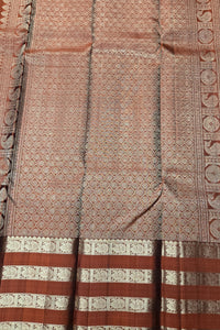 Traditional saree with intricate patterns and colors